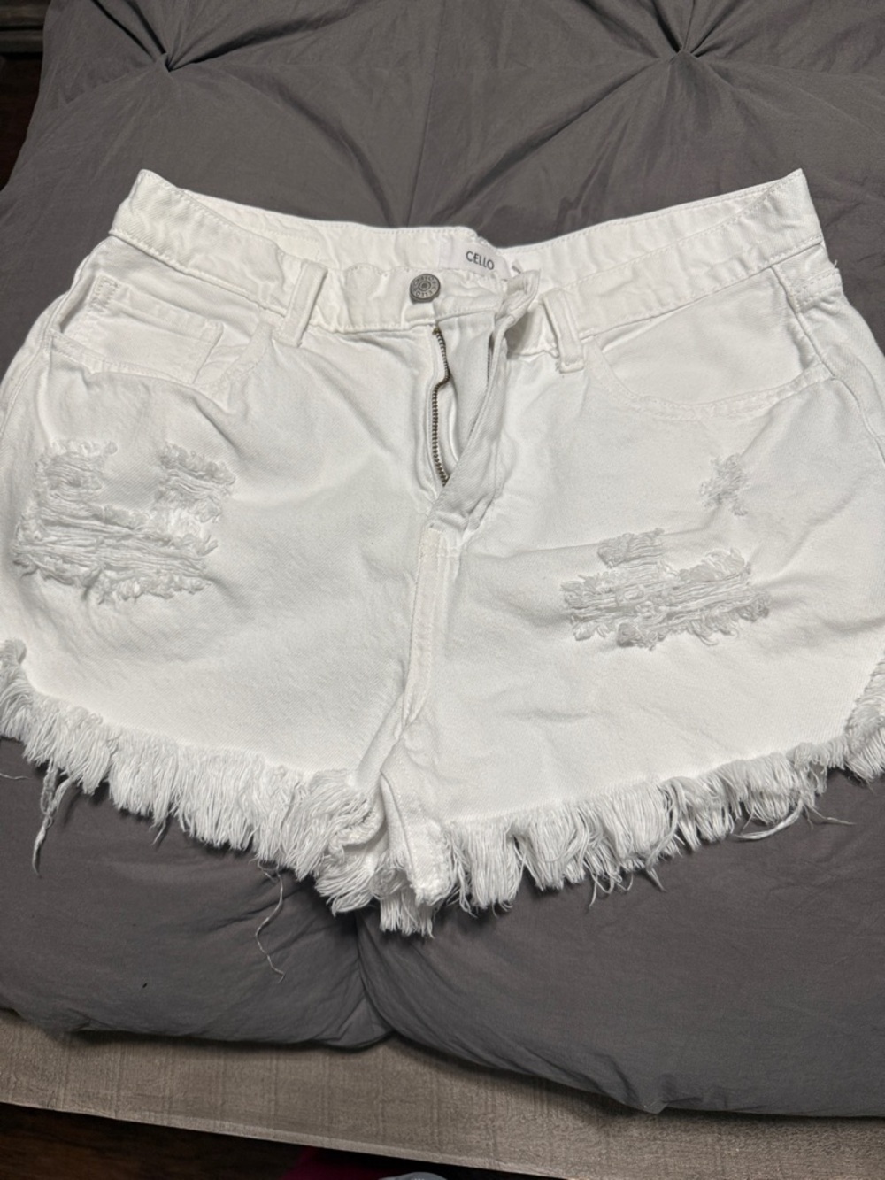 Cello White Distressed Frayed-Hem Jean Shorts fits more like a medium